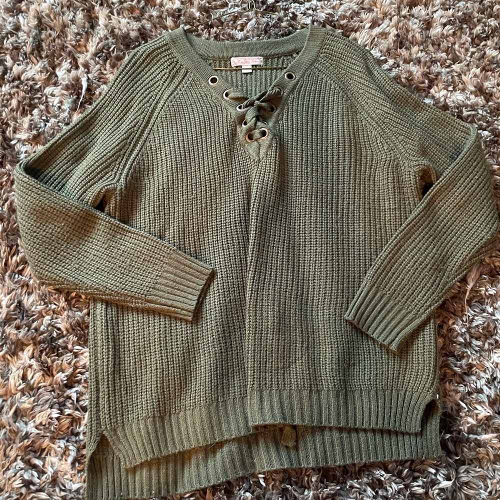 Green tie sweater